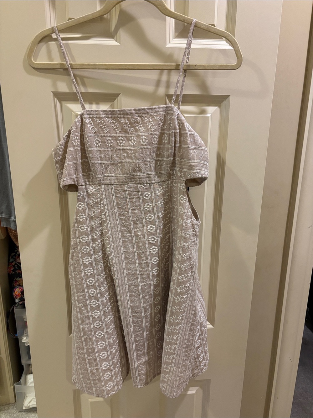 Brown patterned dress with cuts outs on the side